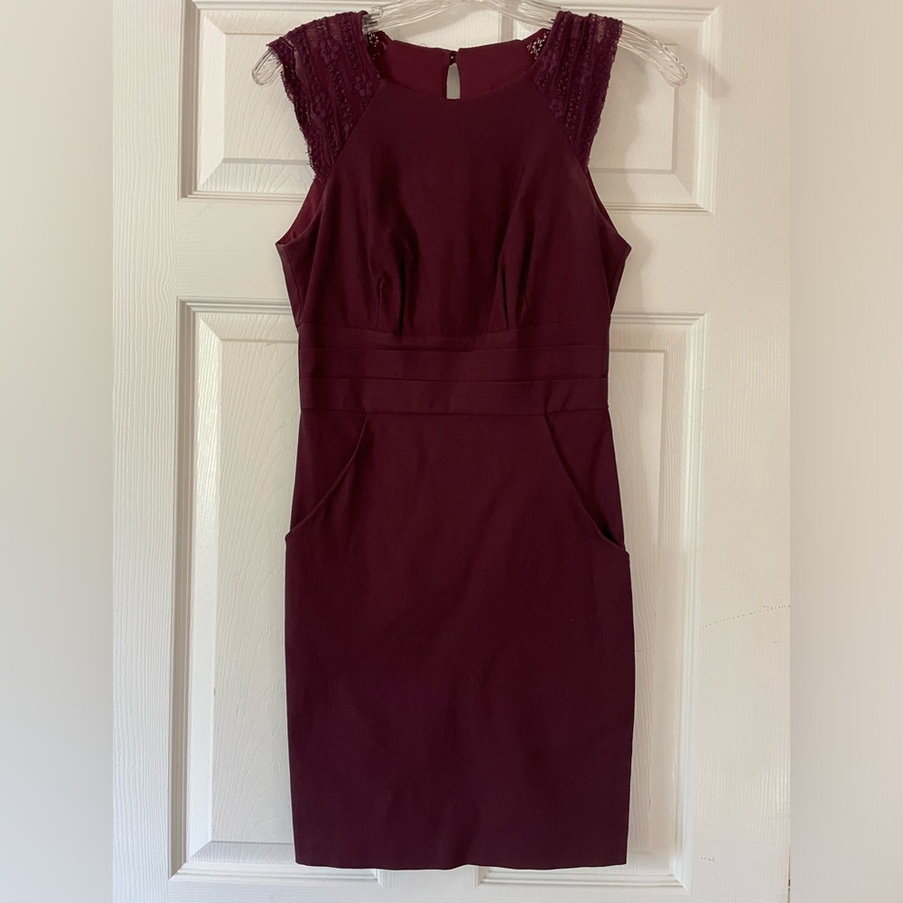 Eggplant purple dress. Size 4. stretchy material. Worn once, good condition.